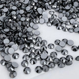Assorted metallic grey round crystal chatons with faceted tops, loose pieces