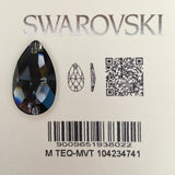 A faceted pear shaped Swarovski crystal sew on stone in Graphite colour, displayed on its white backing card alongside a barcode, line drawings, and a QR code.