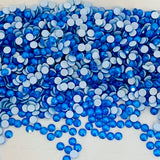 Electric blue Swarovski crystal chatons with silver-toned flat backs, scattered