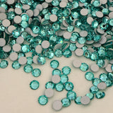Preciosa crystal MAXIMA Rose no hotfix flat back scattered group of stones in colour Caribbean Sea, dura foil backing evident