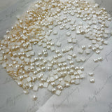 Cream pearl square hotfix crystals, small cabochons mixed across surface