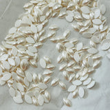 Swarovski hotfix navette crystals in crystal creampearl, oval cabochons scattered