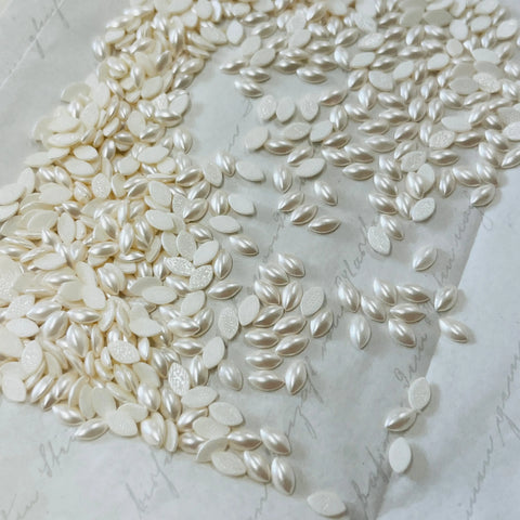 Pearl-white hotfix navette crystal stones, leaf-shaped cabochons on backing