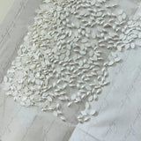 White pearl-effect navette hotfix crystals, oval cabochons in dense pile