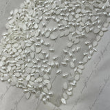 Pearl drop-shaped hotfix crystals, teardrop cabochon gems in a pile