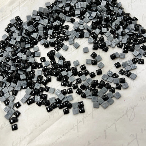 Swarovski crystal hotfix square cabochons, black with silver-tone facets, scattered