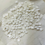 Pearl-look square hotfix crystal cabochons, densely scattered