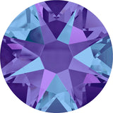 Stock photo of Swarovski Crystal Xirius Rose flat back stones in Crystal Heliotrope a blue and purple mix