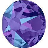 Stock photo of Swarovski Crystal Xirius Rose flat back stones in Crystal Heliotrope a blue and purple mix