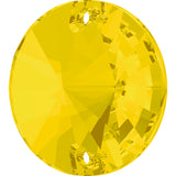 stock image of Swarovski Crystal Article 3200 Rivol sew on stone in Yellow Opal colour