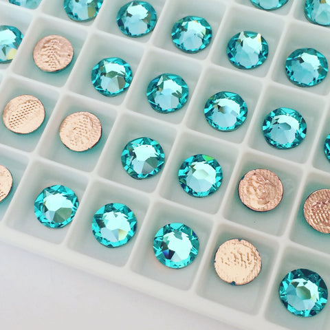 light turquoise faceted round flat backs crystals rhinestones diamantes blue green ocean like