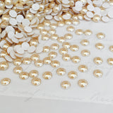 actual image of golden shadow cabochons crystals from Swarovski pale gold unfaceted domes