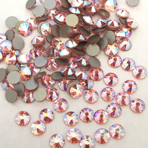 actual photo of Swarovski Crystal Light Rose AB faceted flat backs to glue on
