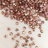 real photo of Swarovski Crystal Hotfix rhinestones in Rose Gold tiny sizes