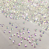 tiny Swarovski hot fix stones in Crystal Transmission with clear glue