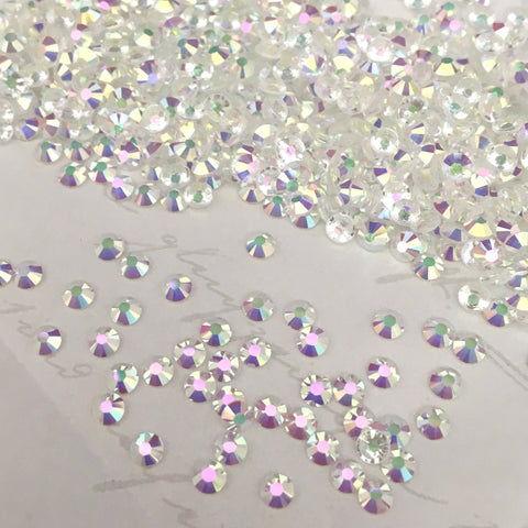 tiny Swarovski hot fix stones in Crystal Transmission with clear glue