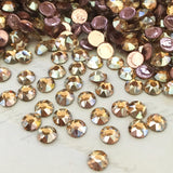 actual photo of Swarovski Crystal Golden Shadow effect on a flat back stone gold toffee colour