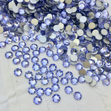 zoomed out photo showing Swarovski Provence Lavender the colour in glue on stones