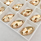 real photo of article 3223 navette sew-on stones from Swarovski Elements range the effect is golden shadow
