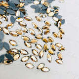 actual photo of Navette Marquise shape crystals for Swarovski hotfix range in Golden Shadow
