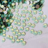 real photo of Xirius Rose stones from Swarovski in pale mint green Chrysolite Opal
