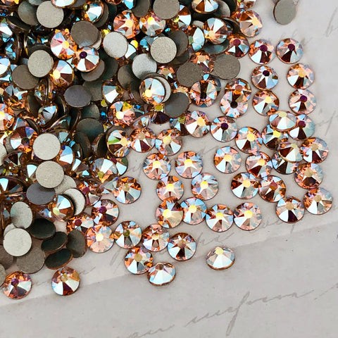 actual photo of Swarovski Crystal flat back in Light Peach AB a pale orange effect