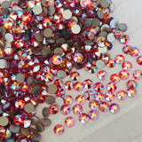actual photo of Swarovski Fire Opal AB Xirius Rose flat back stone